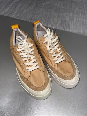 Oncept Women’s 7 London Low Top Leather Sneakers in Latte with Yellow Heel Tab